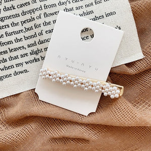 Woman elegant geometric pearl hairpins and hair clips